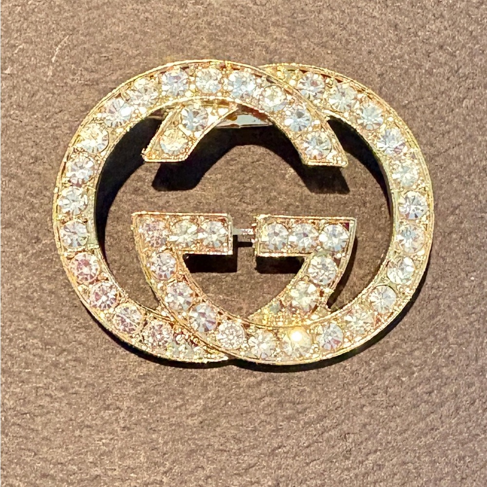 Gucci logo gold and silver crystal Brooch
